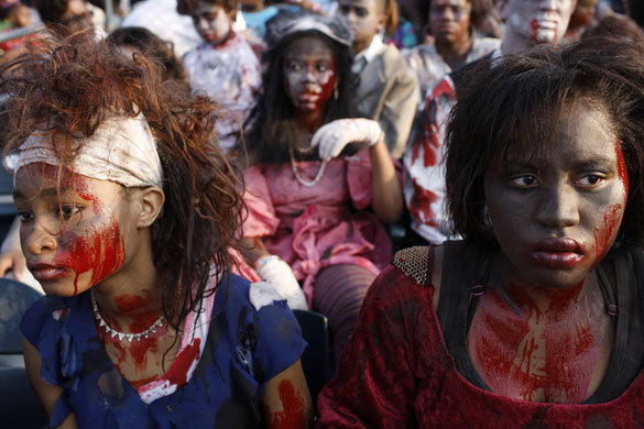 24hours in pictures: People dressed as zombies, prepare to perform Michael Jackson's 