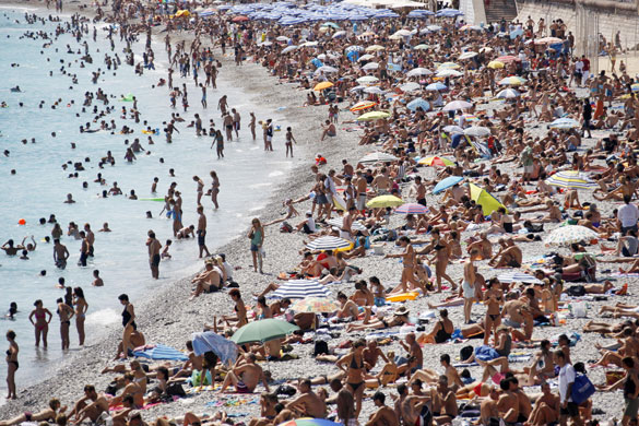 13 July 1009: : Nice, France: People enjoy the summer