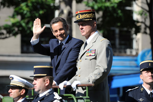 Bastille Day: Nicolas Sarkozy waves to the crowd