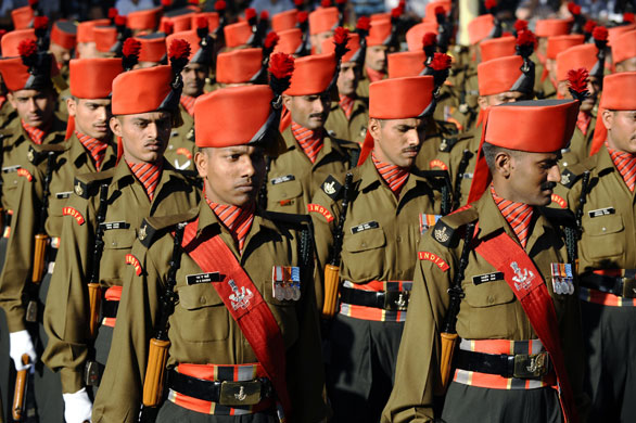 Bastille Day: Indian troops stand guard prior to the start of the military parade