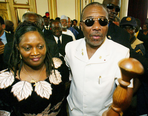 Charles Taylor: 2003: Liberian ex-President Charles Taylor, carrying his staff