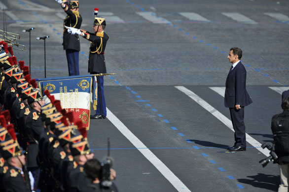 Bastille Day: Nicolas Sarkozy stands in front a military band