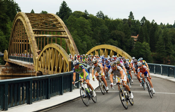 Tour de France Stage 10: The peloton crosses over the Dognon bridge after their first climb
