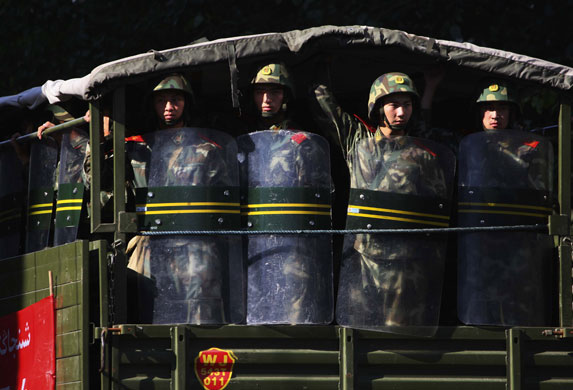 16 July 2009: Urumqi, China: Security forces patrol the streets