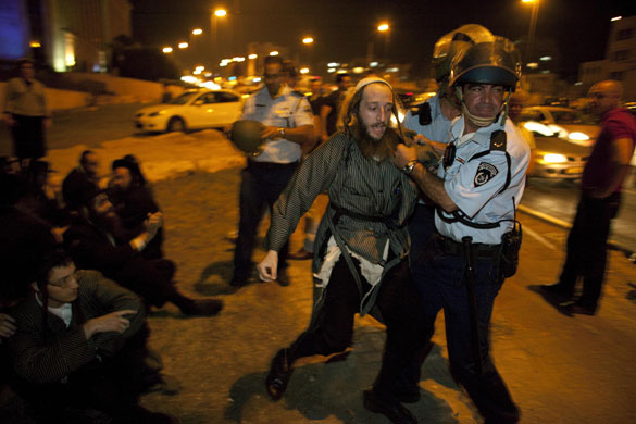 24 hours in pictures: Jerusalem, Israel: Orthodox jew is arrested during clashes with police 