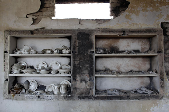 24 hours in pictures: Remains of a destryed house  in the Swat Valley, Pakistan