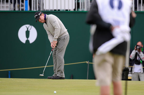 Open Golf Day 2: Tom Watson holes this putt on the 18th green for a birdie and joint lead