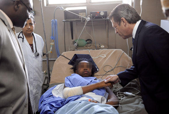 Yemenia airways update: Bahia Bakari, shakes hand with French Cooperation Minister Alain Joyandet 