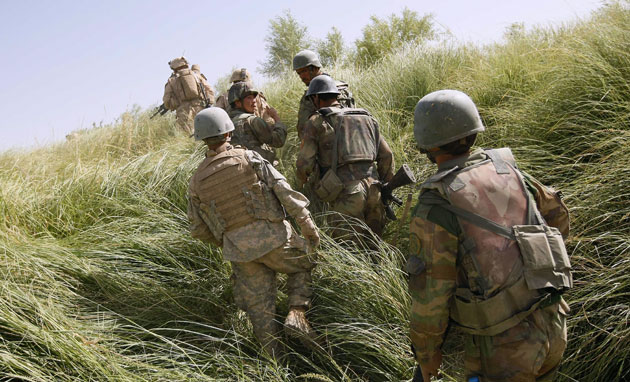 Operation Khanjari: Soliders and Marines patrol together during the start of Operation Khanjari