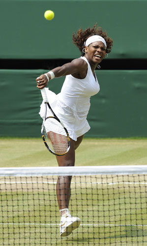 Wimbledon day ten: Serena Williams plays a volley