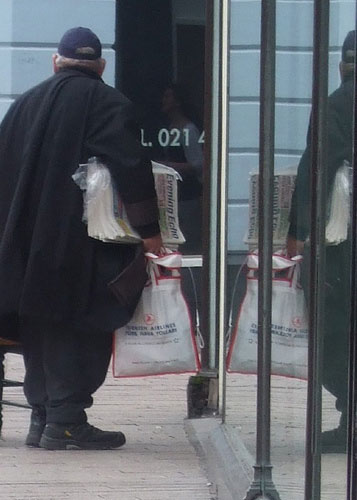 silverweaver3 assignment: Newspaper seller. backview