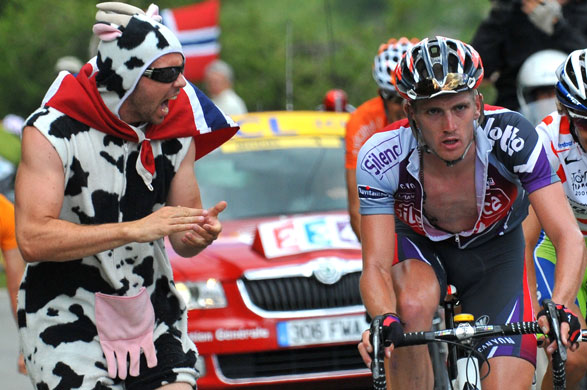 Tour de France stage 16: A fan dressed up as a cow cheers on Jurgen Van den Broeck