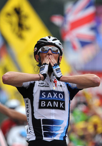 Tour de france stage 17: Frank Schleck celebrates as he crosses the finish line