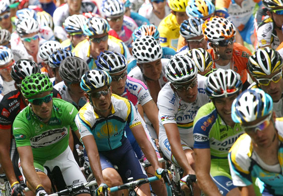 Tour de france stage 17: Thor Hushovd, wearing the green jersey of best sprinter, rides in the pack 