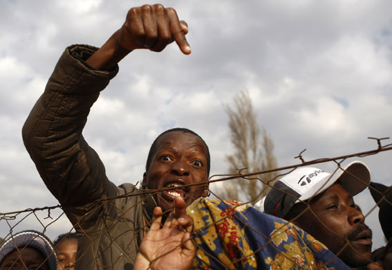 South Africa violence: A protester gestures in Siyathemba township outside Balfour