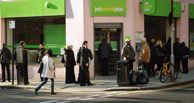 Business week in pictures: People queue outside a branch of the Job Centre