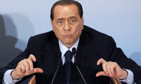 Silvio Berlusconi at a news