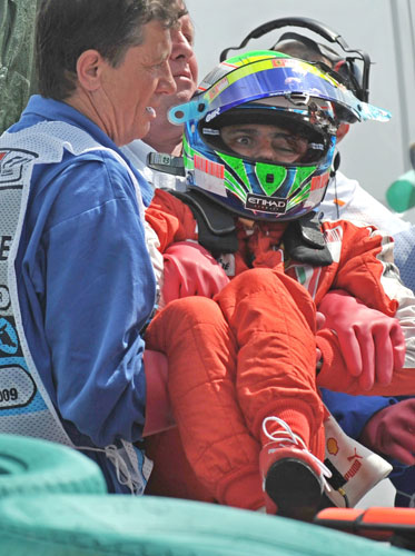 Budapest qualifying: Felipe Massa is carried out of his car after his high speed crash 