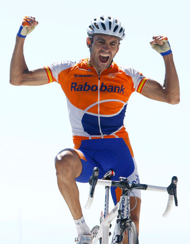 Tour de France Stage 20:  Juan Manuel Garate celebrates as he crosses the line to win the stage