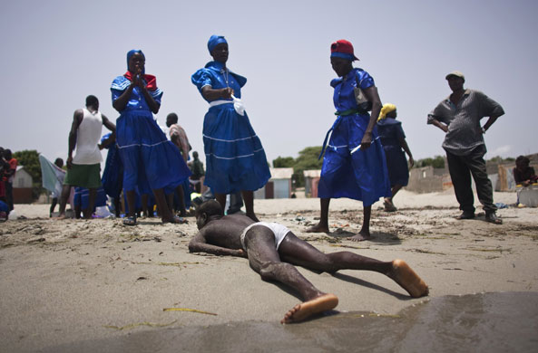 26 July 2009: Limonade, Haiti: Voodoo believers perform a religious ceremony
