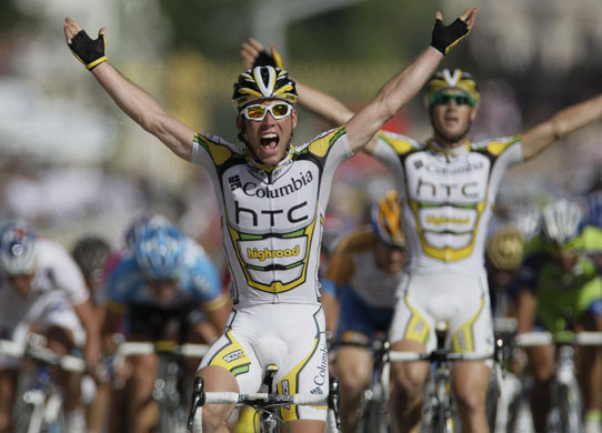Tour de France: Paris: Mark Cavendish reacts as he crosses the finish line to win