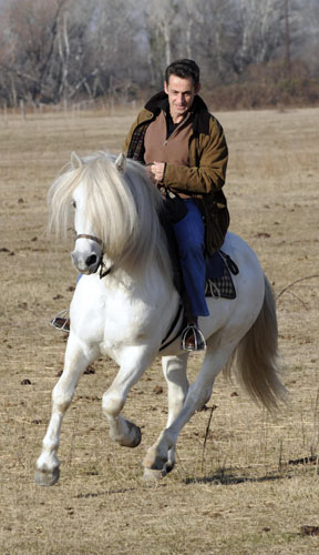 Nicolas Sarkozy exercise: 18 December 2007: Nicolas Sarkozy rides a horse in the 'Mas du Juge'
