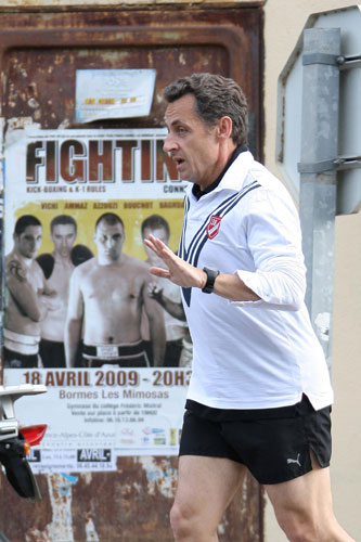 Nicolas Sarkozy exercise: 8 May 2009: Nicolas Sarkozy jogs from his house at Cap Negre in Cavaliere