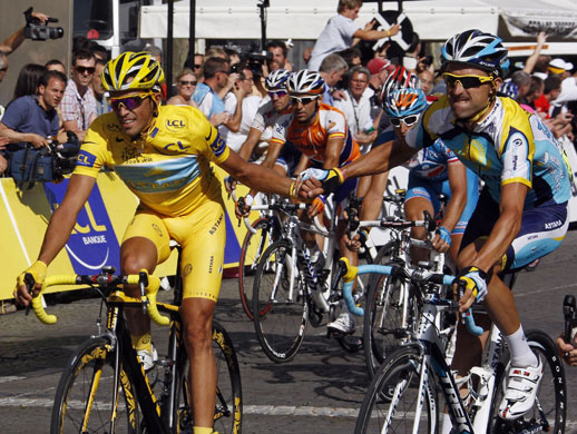 Tour de France Paris: Alberto Contador is congratulated by a teammate