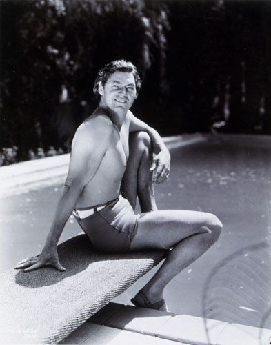 Men in swimsuits: 1934: Johnny Weissmuller, Olympic swimmer and Tarzan actor
