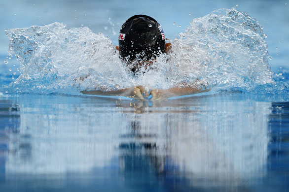 FINA swimming champs: Rebecca Soni wins Gold in the women's 100m breaststroke