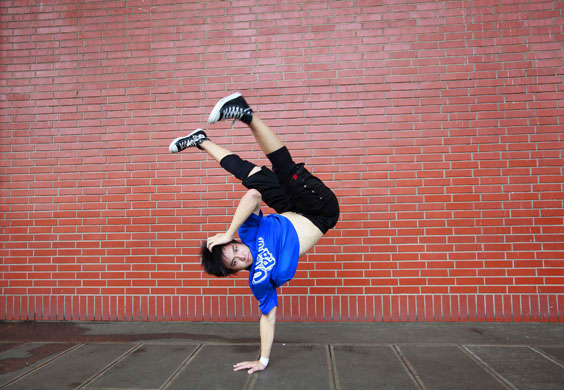 24 hours: a breakdancer poses for a photo in Taipei