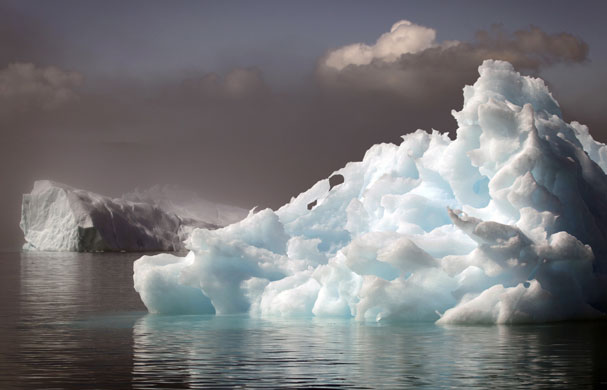 24 hours: Icebergs float in a fjord near the south Greenland town of Narsaq