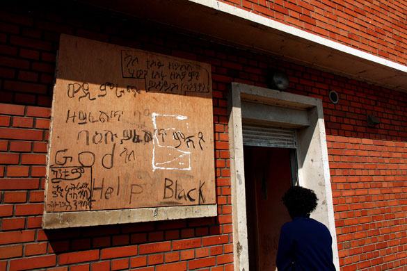 Eritrean refugees Calais: Graffiti in a mixture of tigriny and English
