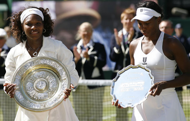 Wimbledon: Day 12: Wimbledon: Day 12 Serena and Venus Williams with their trophies