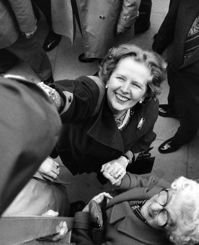 Margaret Thatcher: 1984: Margaret Thatcher shakes someone's hand at the Liverpool Festival