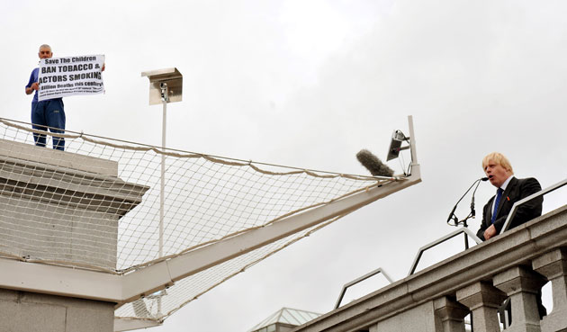 Trafalgar Square plinth: Mayor Boris Johnson makes a speech watched by protester Stuart Holmes