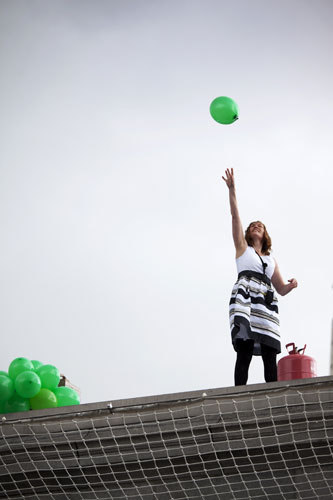 Trafalgar plinth: Jill Gatcum releases a balloon as she stands on the fourth plinth