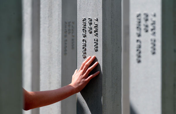 7/7 memorial Hyde Park: A hand placed on one of the 52 memorials in Hyde Park