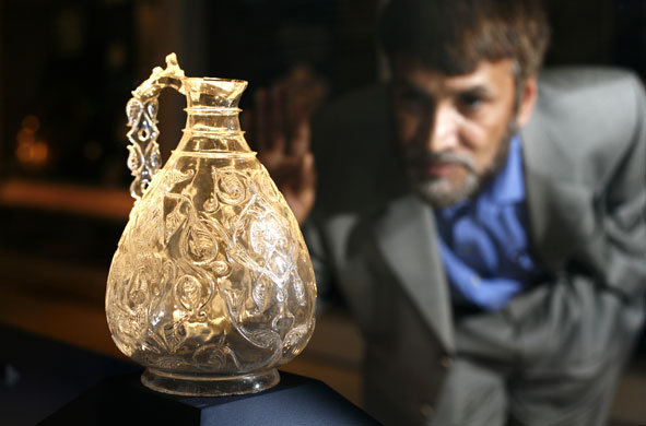Jameel prize: Dr Bari examines a rock crystal ewer at the Victoria & Albert Museum