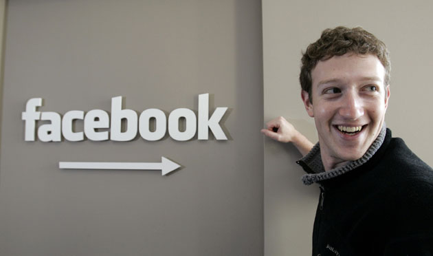 Media 100 Top 20: Facebook's mastermind Mark Zuckerberg smiles at his office in Palo Alto