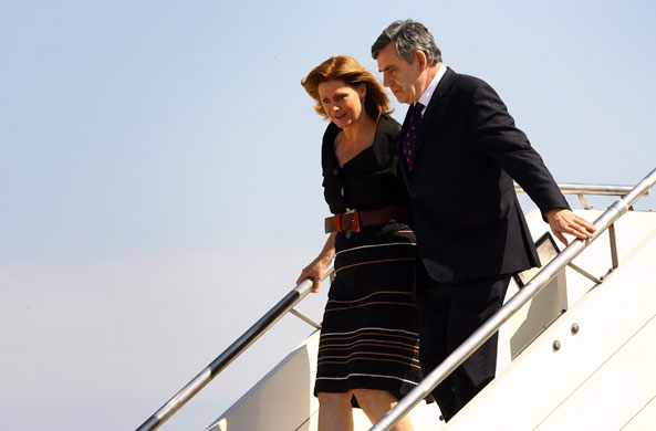 G8 preparations: Prime Minister Gordon Brown and his wife Sarah Brown arrive at Rome airport