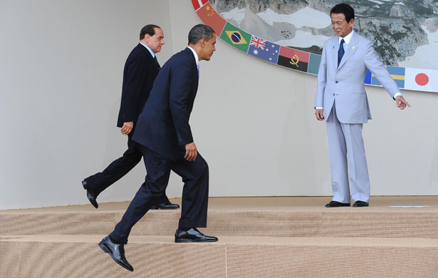G8 summit: Barack Obama and Silvio Berlusconi approach the stage