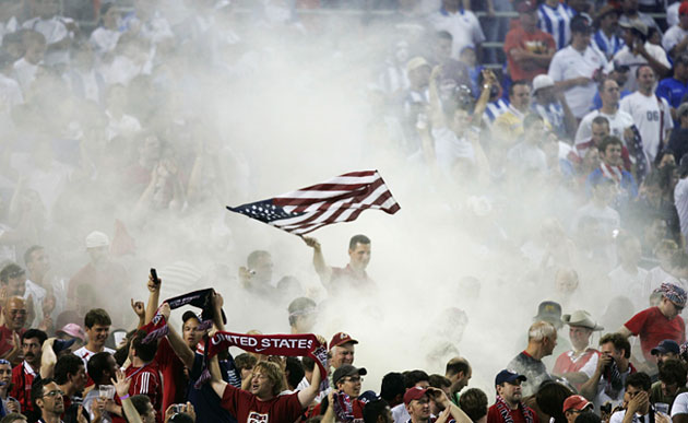 24 hours  in sport: U.S. fans celebrate a goal against Honduras