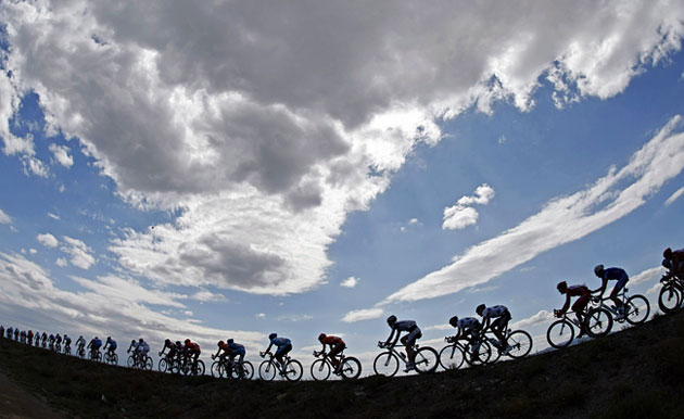tour de france: Competitors cycle during the tour de france
