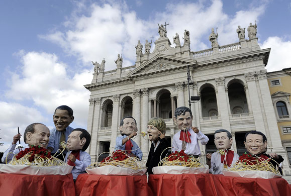 G8 summit update: Members of aid agency Oxfam and Ucodep protest