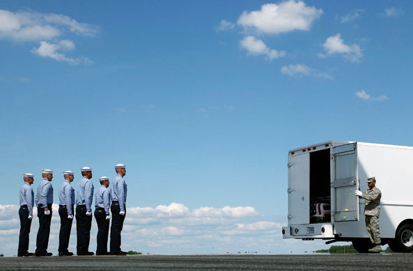 24 hours in pictures: Bodies Of Military Personnel Killed In Afghanistan Return To U.S.