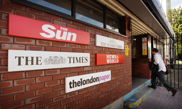 Week in business: Newspaper titles at the News International plant at Wapping