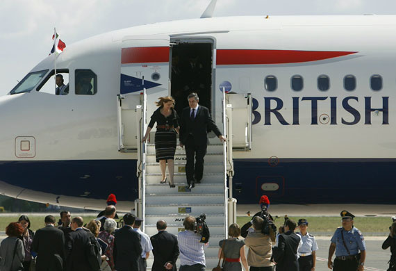 Week in business: Prime Minister Gordon Brown leaves a British Airways plane in Rome.