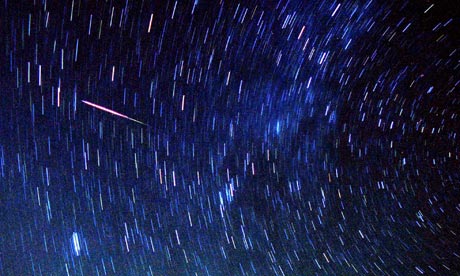 Meteors streak past stars in the night sky near Amman