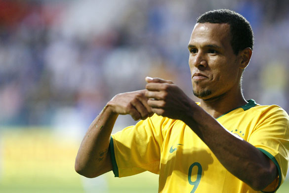 Football round the globe: Luis Fabiano celebrates putting Brazil ahead in their friendly in Estonia